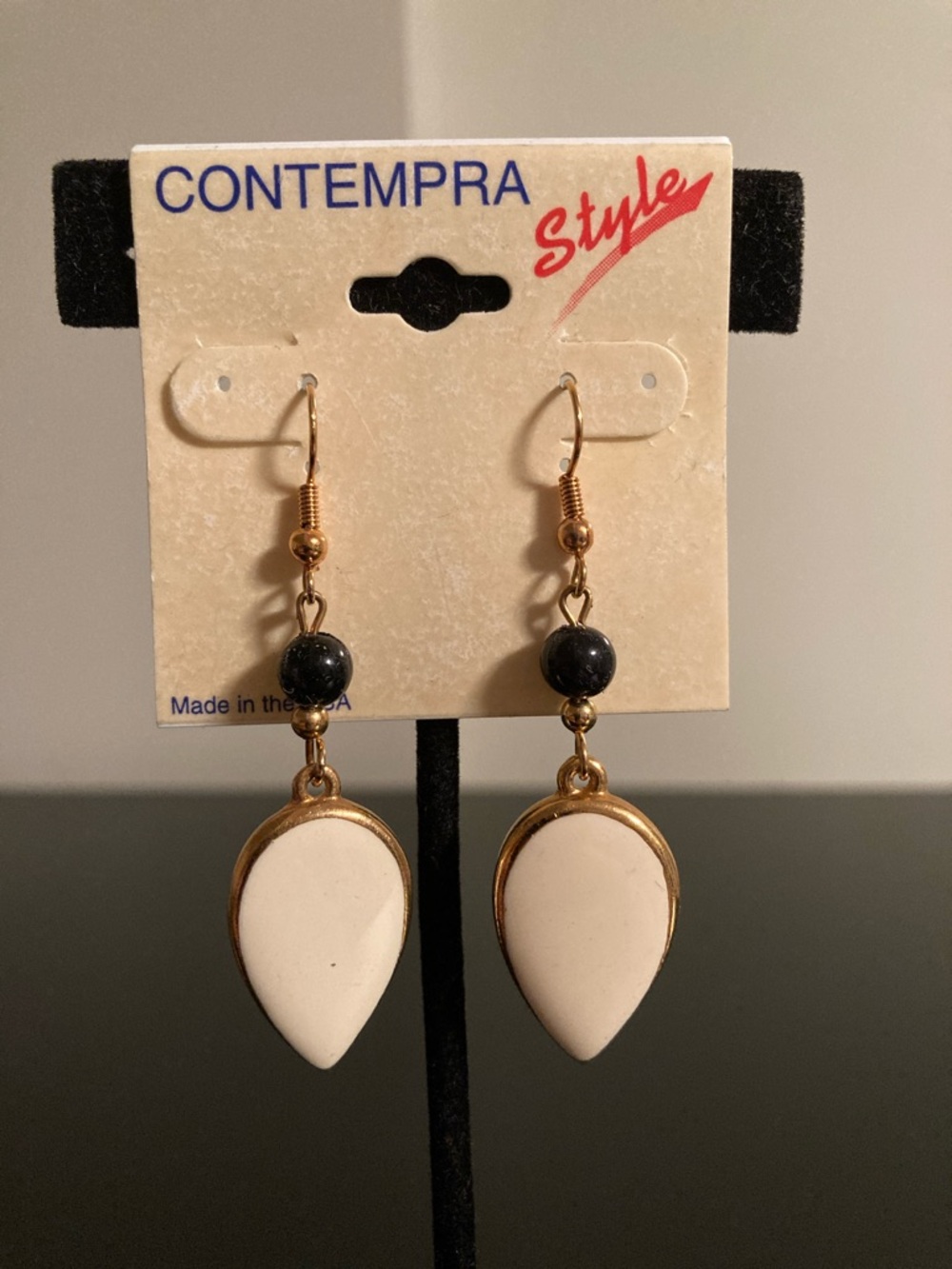 White Teardrop Dangle Earrings with Gold Accents
